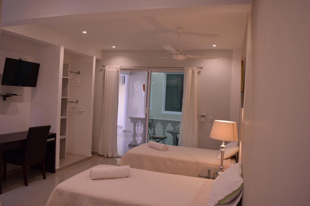 Aparthotel Casa Bella Vida Playa del Carmen Pokoj fotografie